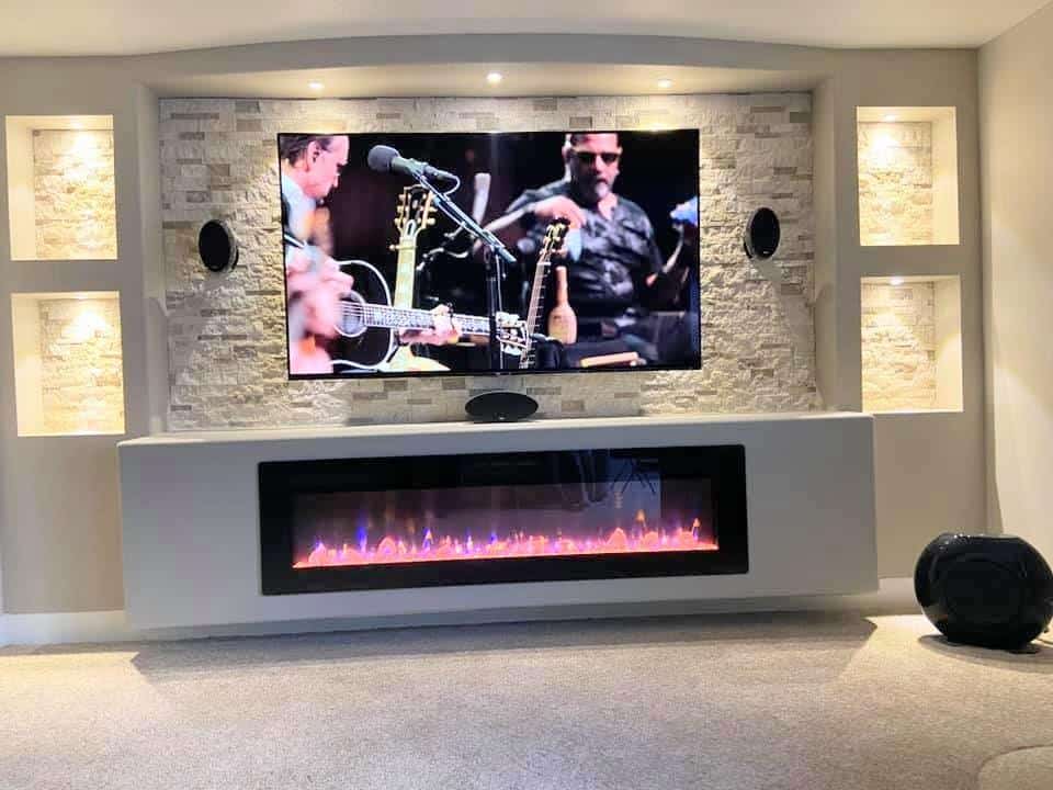 A sleek entertainment center with a fireplace and TV