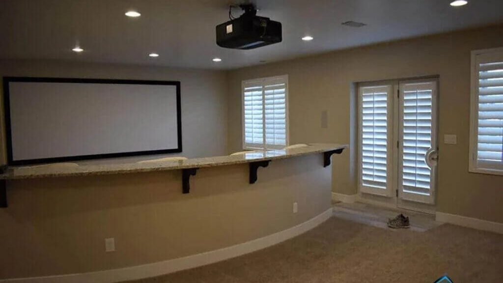 how much value will finishing my basement add to my home? 2026 guide 2 Finished basement designed as a modern entertainment space
